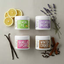 Load image into Gallery viewer, All 4 Mi Coco es su Coco lotion jars — Lemon Pie, Lavender Dreams, Vanilla Cupcake, Winter Cookies — with matching scent ingredients on linen